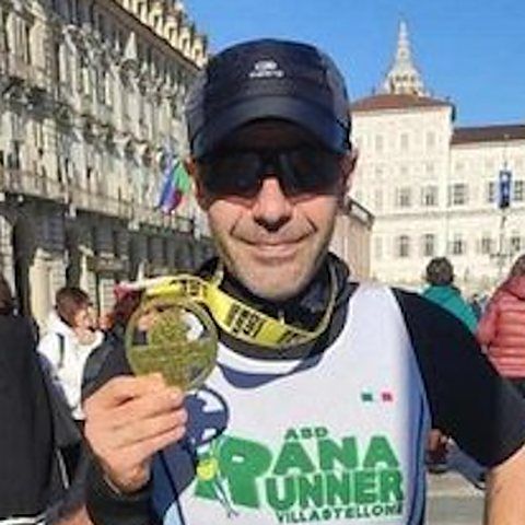 Michele Marino, il fondatore di allenario, con la medaglia dopo una gara a Torino
